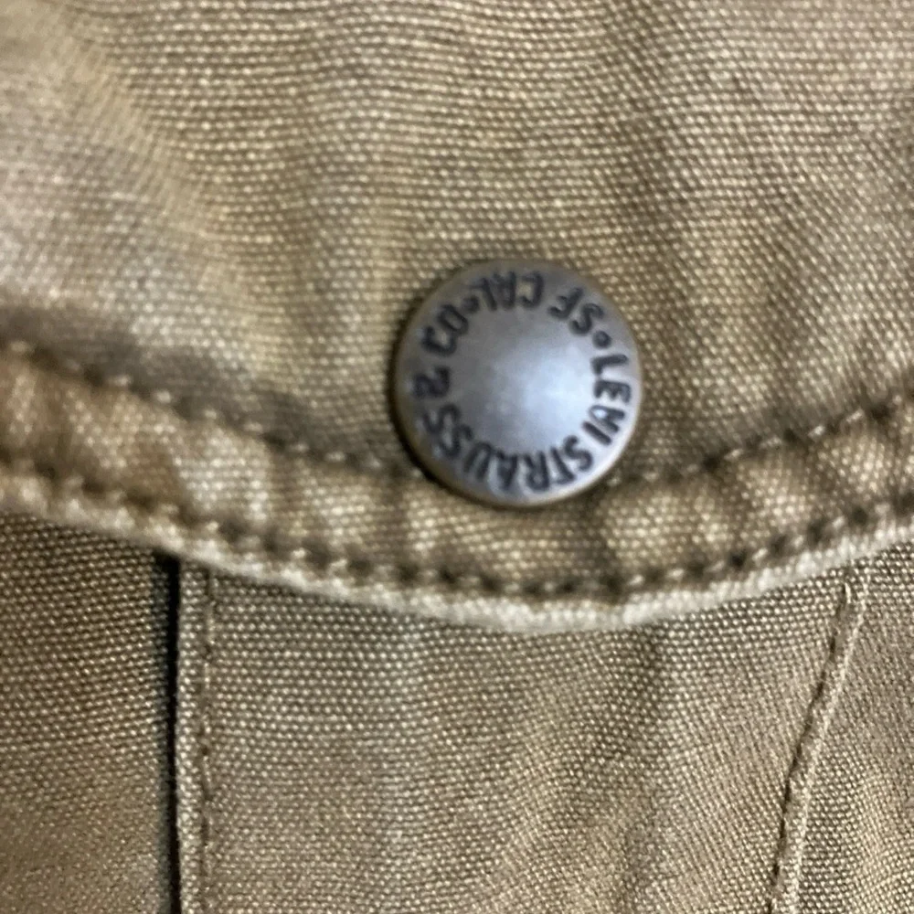 Levi’s canvas jacket with fleece lining and quotes arms Small Silver label